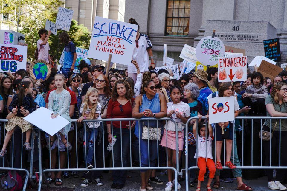 group of people holding a strike about a social movement